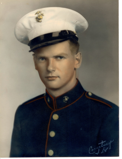 Leon Minger Ramsey wearing a U.S. Navy uniform and white sailor cap.