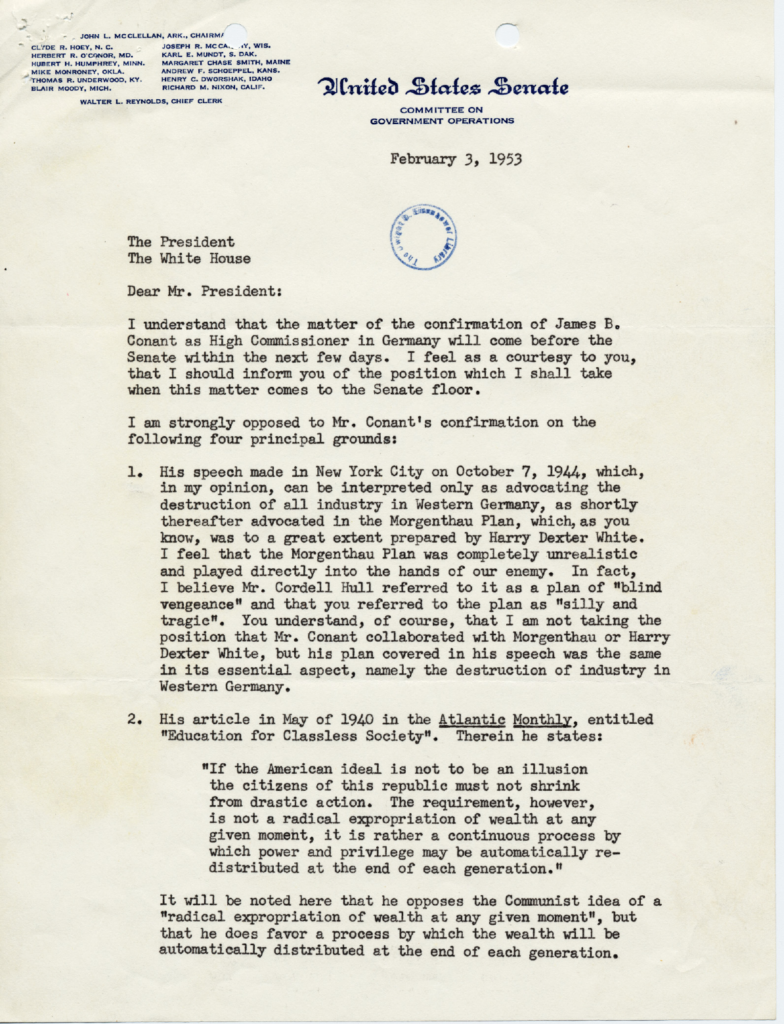 Aged typewritten letter with an official stamp and signature.