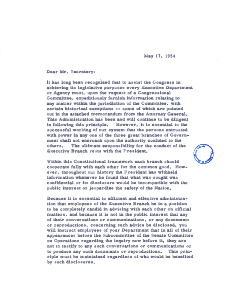 Scanned typewritten letter with an official stamp.