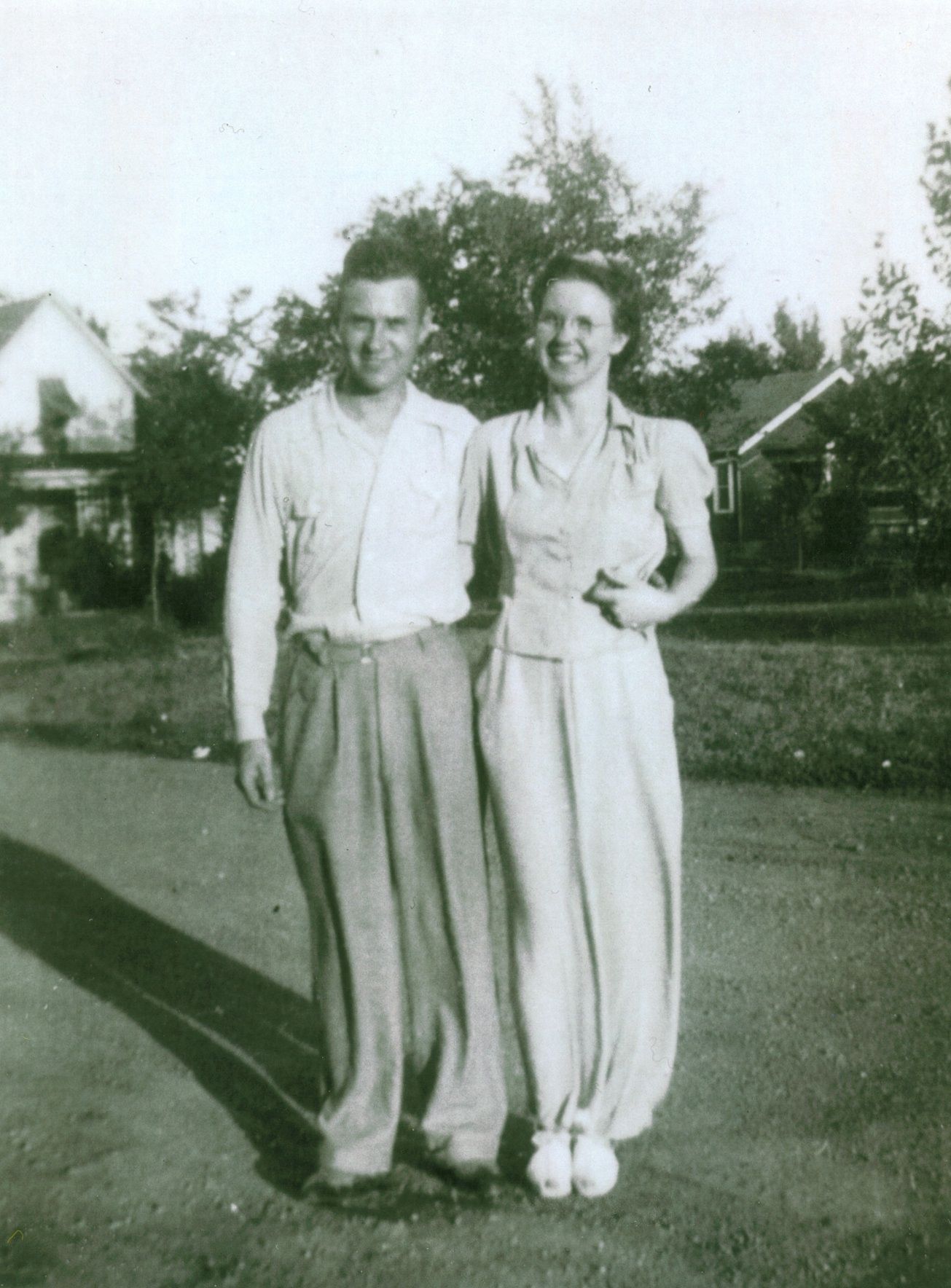 Marlin Edmondson standing outdoors beside a woman.