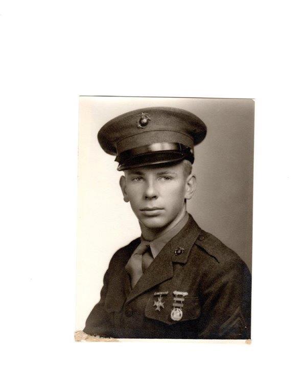 Wallace A. Mason Jr. wearing a military dress uniform and cap.