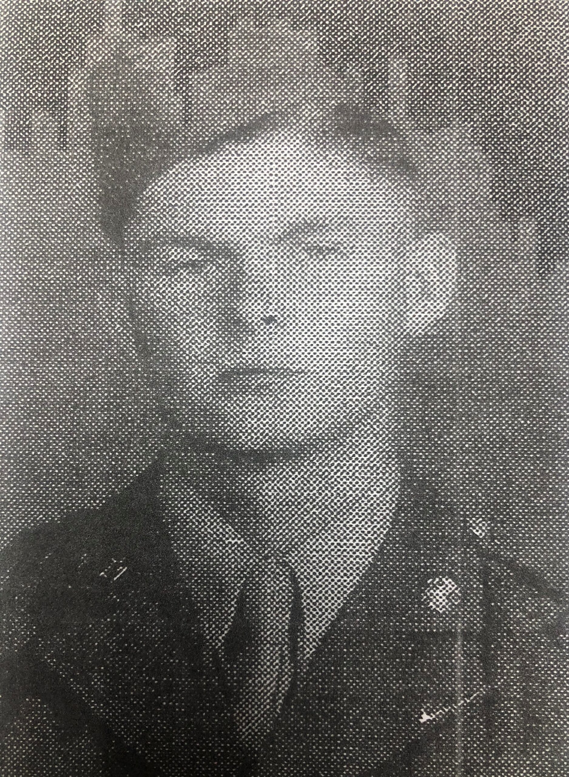Milton Brillhart shown in a grainy military portrait.