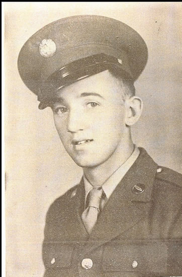 Young serviceman wearing a military uniform and cap.
