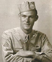 Young serviceman wearing a military uniform and garrison cap.