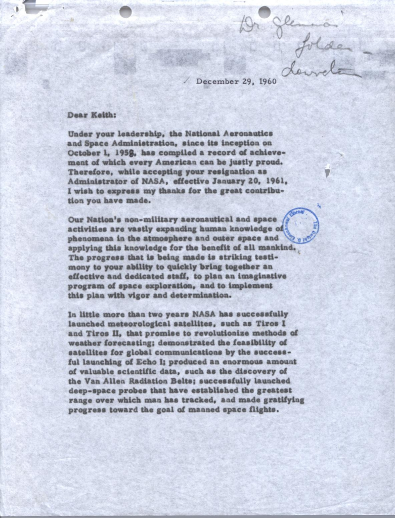 Blue-tinted scan of a typewritten letter with an official stamp.