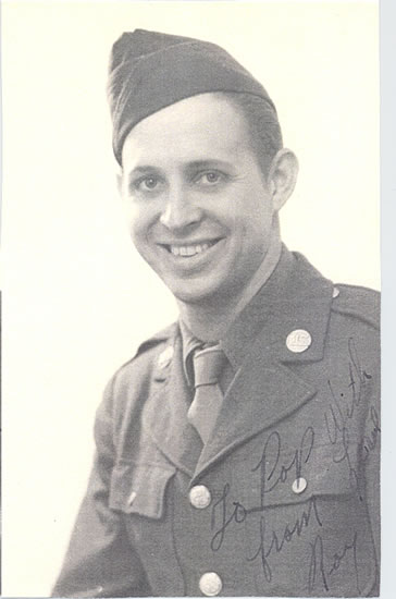Smiling serviceman wearing a U.S. Army uniform.