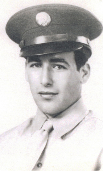 Young serviceman wearing a military uniform and peaked cap.