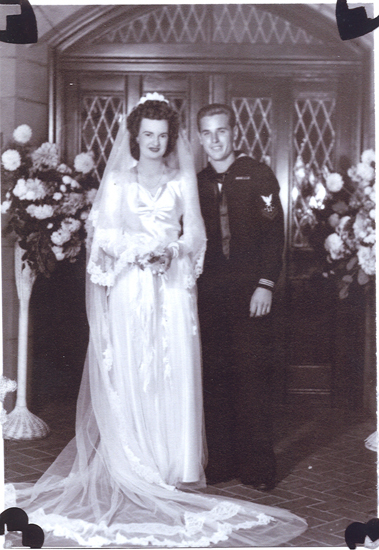 Paul Stephen Gilbert posing with a bride on their wedding day.