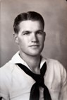 Young man shown in a formal black-and-white portrait.