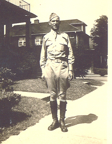 Pius F. Richter standing outdoors in a military uniform.