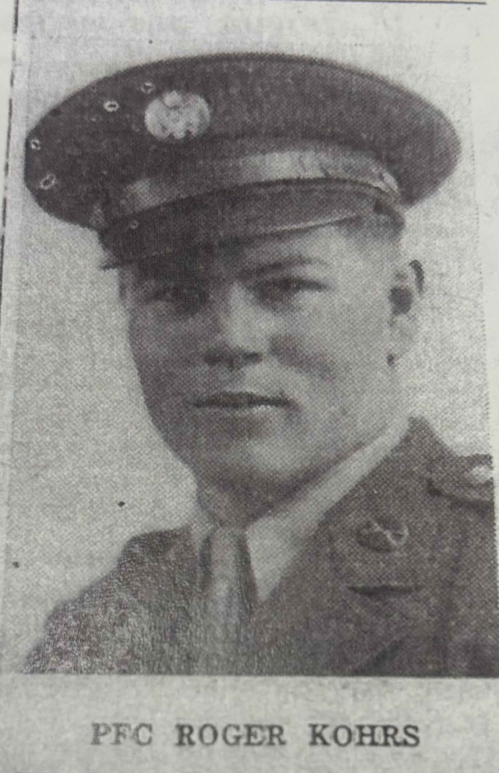 PFC Roger Kohrs wearing a military uniform and peaked cap.