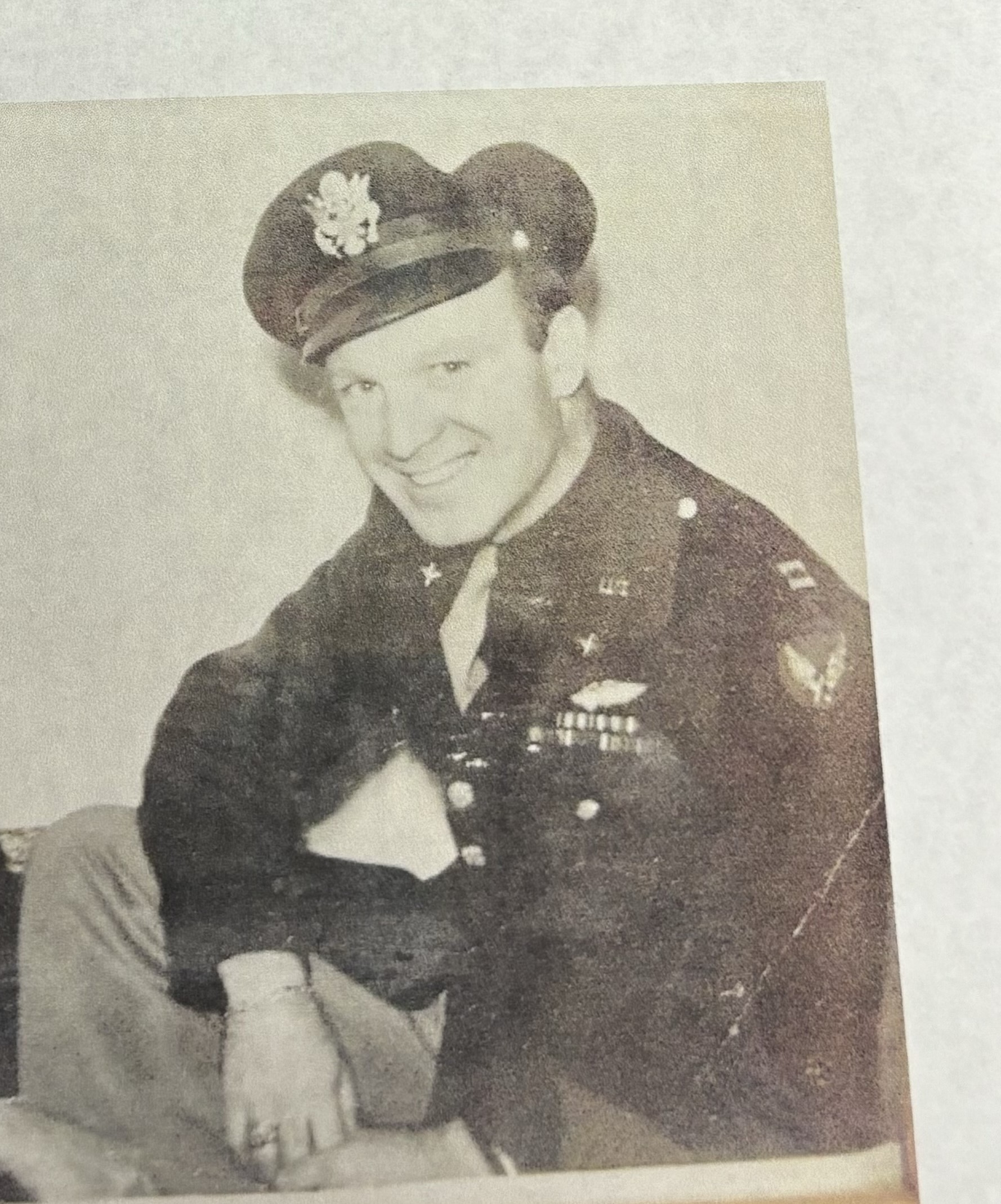 Raymond Hill wearing a decorated military uniform and cap.