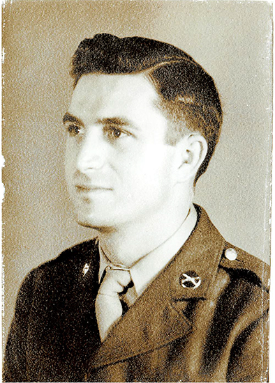 Raymond Adam Schra shown in profile in a formal portrait.