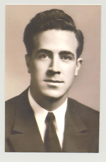Raymond Alexander shown in a formal black-and-white portrait.