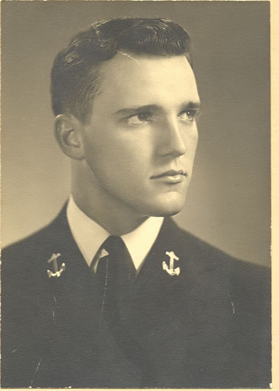 Robert Henry Royer shown in profile wearing a suit and tie.