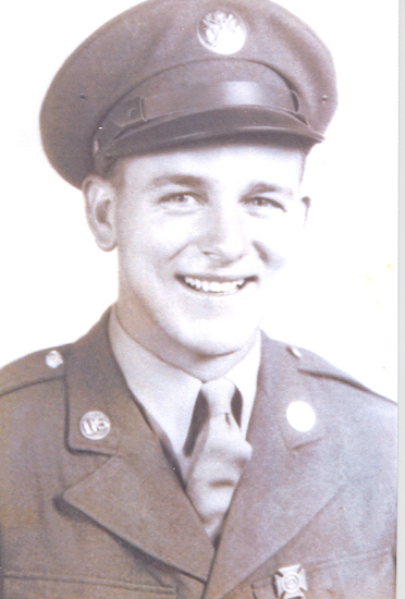 Smiling Robert Troy Shirey wearing a military uniform and peaked cap.
