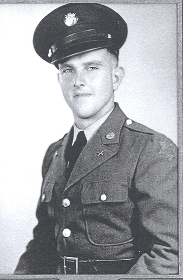 Portrait of a young serviceman wearing a U.S. Army uniform and peaked cap.