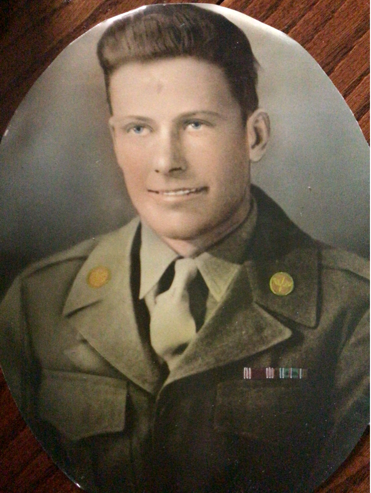 Young serviceman wearing a U.S. Army uniform in a colorized portrait.
