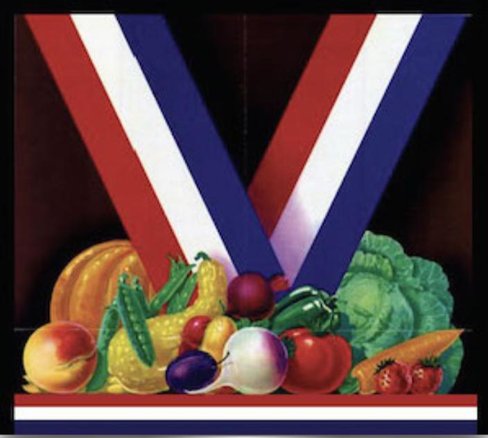 Red, white, and blue V-shaped ribbon displayed above assorted vegetables.