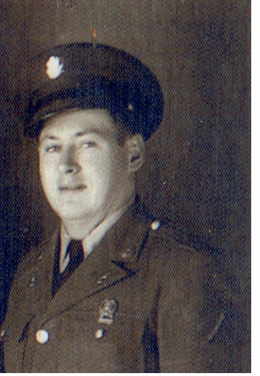 Young serviceman wearing a military uniform and peaked cap.