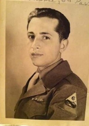Man in military uniform; black-and-white photo.