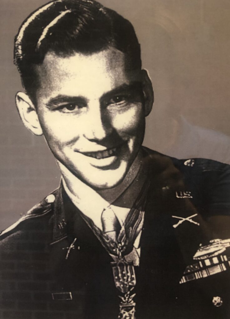 Smiling Walter Ehlers wearing a military uniform in a close-up portrait.