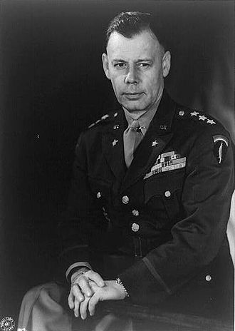 Senior U.S. Army officer wearing a decorated dress uniform.