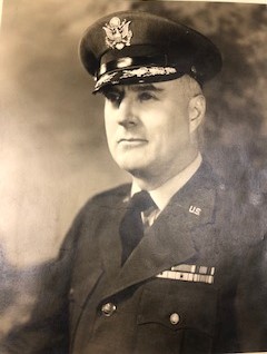 Wayne Kester wearing a decorated U.S. Army uniform and peaked cap.