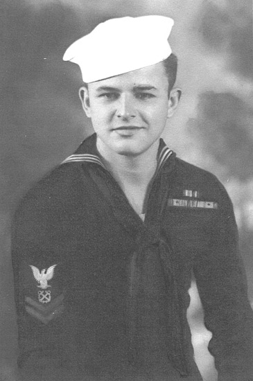A navy sailor in uniform.