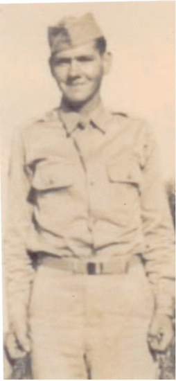 Faded portrait of a serviceman wearing a light-colored military uniform.