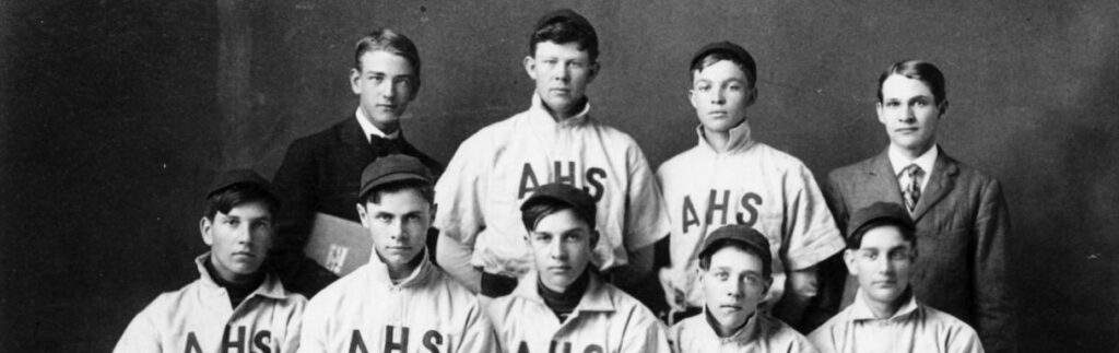 Young baseball players, including Dwight D. Eisenhower, posing together in team uniforms.