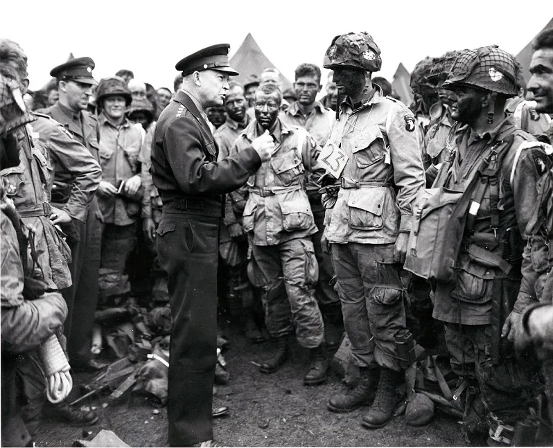 General Dwight D. Eisenhower speaks with paratroopers before the D-Day invasion.