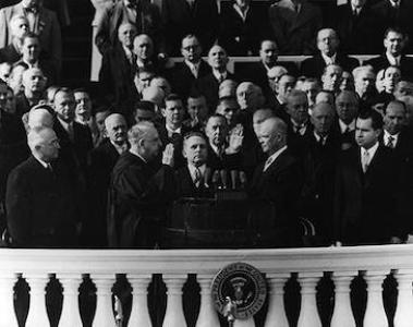 Dwight D. Eisenhower and officials gathered on the platform during his presidential inauguration.