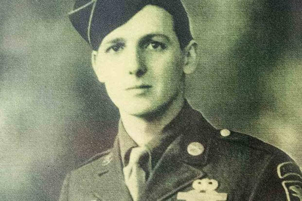 World War II veteran Jim Sharp wearing a military garrison cap.