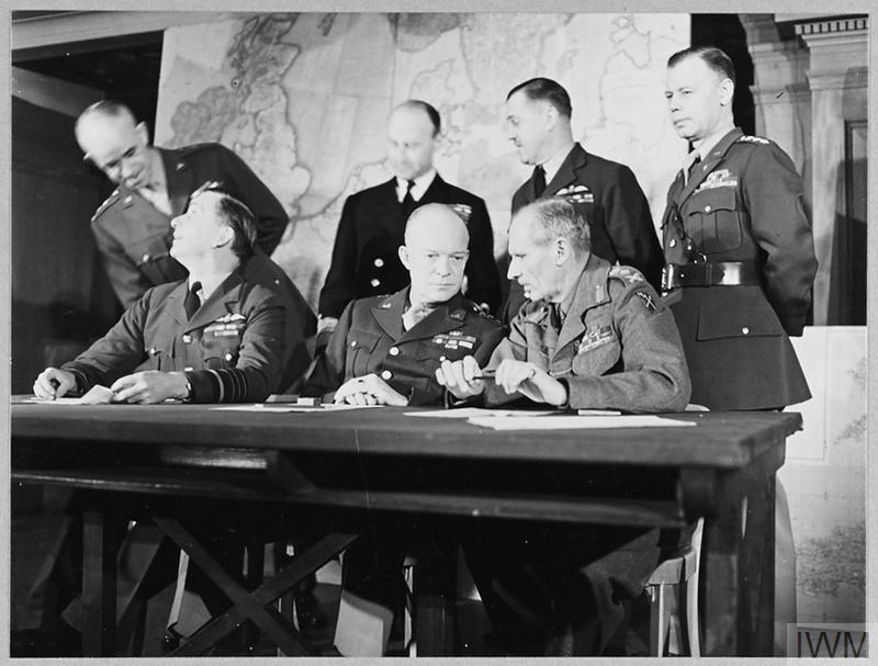 Dwight D. Eisenhower and General Montgomery at the Conference of Chiefs of Staff in London during a wartime meeting.