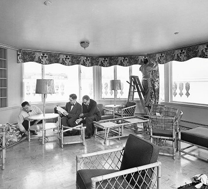 Government and military officials seated around a table during a Project Solarium meeting.