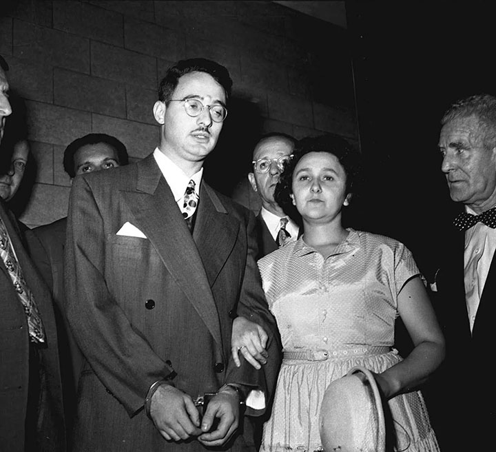 Julius and Ethel Rosenberg standing together in a crowd.